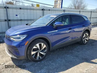 2022 Volkswagen ID.4 Pro S z VIN WVGUNPE29NP071844, wystawiony jako Copart lot #49249195 z przebiegiem 23 970 mil mil oraz Szkody całkowita. Historia ofert i sprzedaży dostępna na DreamBid. Obrazek 1.