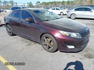 2015 Kia Optima EX with VIN 5XXGN4A75FG391608, listed as a IAAI auction lot 41817373 with 143,031 mi miles. Bid and sale history available at carsss.com. Image 1.