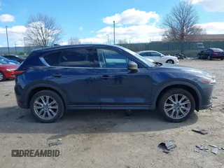 2020 Mazda CX-5 Grand Touring with VIN JM3KFBDM2L0768770, listed as a IAAI auction lot 41695058 with 44,192 mi miles. Bid and sale history available at carsss.com. Image 12.