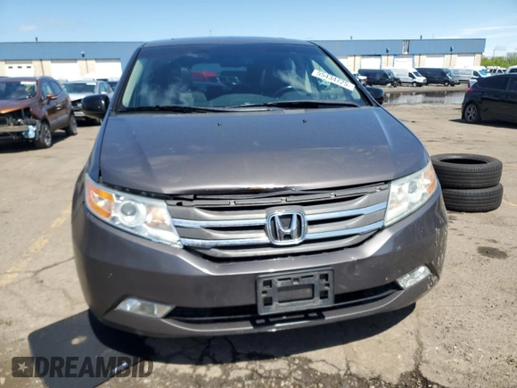 2012 Honda Odyssey Touring with VIN 5FNRL5H90CB093963, listed as a Copart auction lot 55434725 with 202,867 mi miles and Salvage Title. Bid and sale history available at DreamBid. Image 5.
