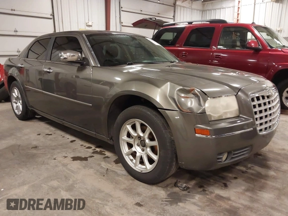 2010 Chrysler 300 Touring with VIN 2C3CA5CV9AH213299, listed as a IAAI auction lot 41754215 with 172,467 mi miles. Bid and sale history available at carsss.com. Image 1.