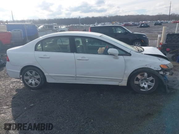 2006 Honda Civic LX with VIN 1HGFA16516L115196, listed as a IAAI auction lot 41572332 with 221,861 mi miles and . Bid and sale history available at DreamBid. Image 13.