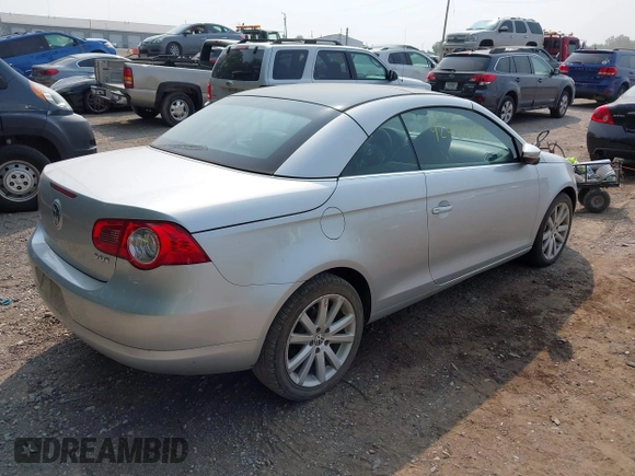2010 Volkswagen Eos Komfort z VIN WVWBA7AH9AV022988, wystawiony jako IAAI lot #42426457 z przebiegiem 142 571 mil mil oraz . Historia ofert i sprzedaży dostępna na DreamBid. Obrazek 4.