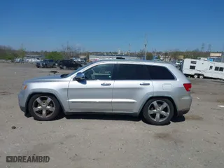 2011 Jeep Grand Cherokee Overland with VIN 1J4RR6GT6BC568491, listed as a IAAI auction lot 42035464 with 147,389 mi miles. Bid and sale history available at carsss.com. Image 14.