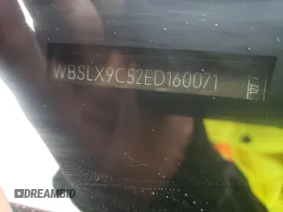 2014 BMW M6 z VIN WBSLX9C52ED160071, wystawiony jako Copart lot #77452554 z przebiegiem 64 814 mil mil oraz Szkoda całkowita • Salvage title. Historia ofert i sprzedaży dostępna na DreamBid. Obrazek 14.