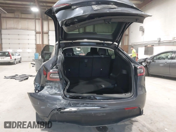 2023 Tesla Model Y Long Range with VIN 7SAYGAEE2PF755674, listed as a IAAI auction lot 41890025 with 24,783 mi miles and . Bid and sale history available at DreamBid. Image 6.