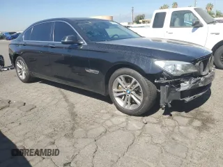 2015 BMW 7 Series 740Li with VIN WBAYE4C59FD947328, listed as a Copart auction lot 68987863 with 117,312 mi miles and . Bid and sale history available at DreamBid. Image 4.