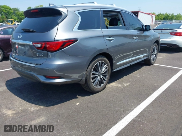2019 Infiniti QX60 Pure with VIN 5N1DL0MN7KC563655, listed as a IAAI auction lot 42469111 with 84,864 mi miles and . Bid and sale history available at DreamBid. Image 4.