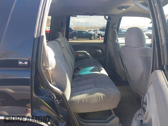 1997 GMC Yukon with VIN 1GKEK13R3VJ759103, listed as a IAAI auction lot 41726127 with 218,500 mi miles. Bid and sale history available at carsss.com. Image 8.