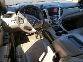 2015 GMC Yukon SLT z VIN 1GKS1BKC2FR244797, wystawiony jako Copart lot #49465995 z przebiegiem 242 448 mil mil oraz Szkoda całkowita • Salvage title. Historia ofert i sprzedaży dostępna na DreamBid. Obrazek 8.