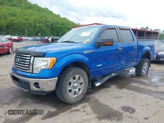 2011 Ford F-150 XLT with VIN 1FTFW1ET7BFB22128, listed as a IAAI auction lot 42214865 with 238,616 mi miles and . Bid and sale history available at DreamBid. Image 2.