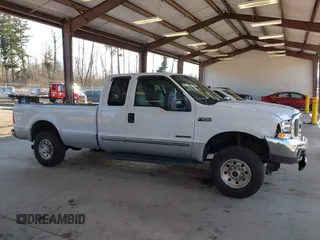 2000 Ford F-250 XL with VIN 1FTNX21F4YEC30722, listed as a IAAI auction lot 41409384 with 310,516 mi miles and . Bid and sale history available at DreamBid. Image 13.