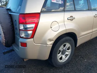 2007 Suzuki Grand Vitara z VIN JS3TD941074200440, wystawiony jako IAAI lot #41125927 z przebiegiem 209 218 mil mil oraz . Historia ofert i sprzedaży dostępna na DreamBid. Obrazek 13.