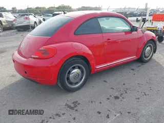 2012 Volkswagen Beetle 2.5L PZEV with VIN 3VWJP7AT0CM641164, listed as a IAAI auction lot 40698387 with 113,200 mi miles. Bid and sale history available at carsss.com. Image 4.