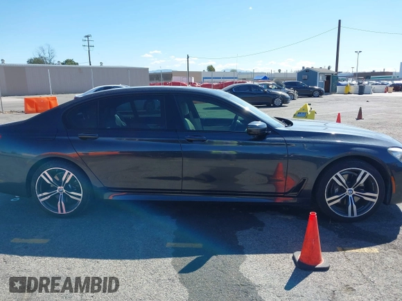 2016 BMW 7 Series 740i with VIN WBA7E2C52GG548048, listed as a IAAI auction lot 41701806 with 72,680 mi miles. Bid and sale history available at carsss.com. Image 13.