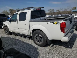 2015 Nissan Frontier Pro-4X with VIN 1N6AD0EV5FN700571, listed as a Copart auction lot 50974615 with 138,930 mi miles and Salvage title. Bid and sale history available at DreamBid. Image 2.