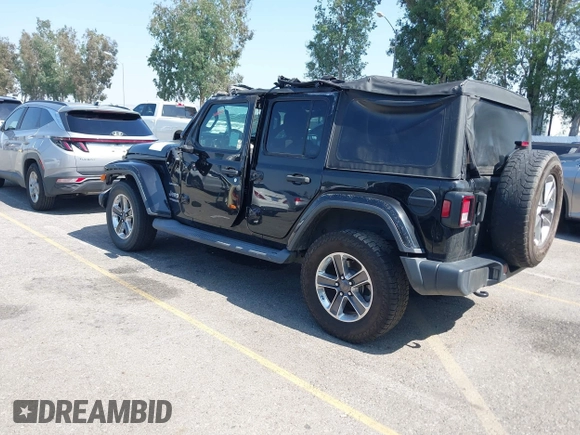 2018 Jeep Wrangler Unlimited Sahara with VIN 1C4HJXEN7JW328981, listed as a IAAI auction lot 42217508 with 59,584 mi miles and . Bid and sale history available at DreamBid. Image 3.