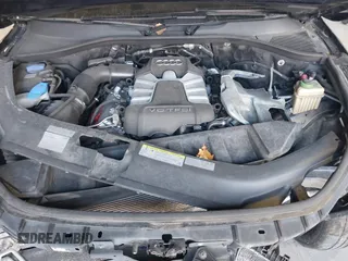 2014 Audi Q7 Premium Plus z VIN WA1LGAFE1ED014792, wystawiony jako IAAI lot #39705499 z przebiegiem 128 659 mil mil oraz . Historia ofert i sprzedaży dostępna na DreamBid. Obrazek 10.