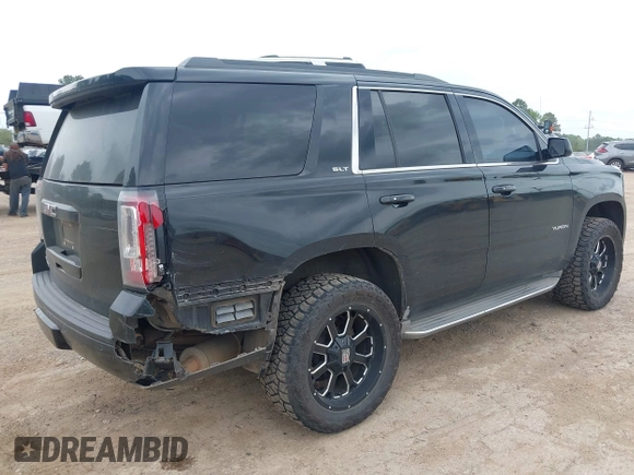 2015 GMC Yukon SLT with VIN 1GKS1BKC5FR274408, listed as a IAAI auction lot 41942157 with 165,978 mi miles. Bid and sale history available at carsss.com. Image 4.
