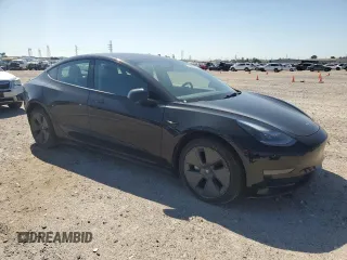 2023 Tesla Model 3 with VIN 5YJ3E1EA1PF456896, listed as a Copart auction lot 50423785 with 49,316 mi miles and Salvage title. Bid and sale history available at DreamBid. Image 4.