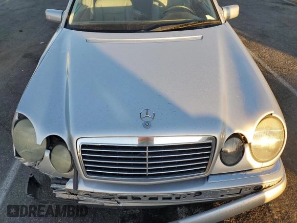 1999 Mercedes-Benz E 320 with VIN WDBJF65H8XA734585, listed as a Copart auction lot 79141194 with 196,908 mi miles and Salvage Title. Bid and sale history available at DreamBid. Image 11.