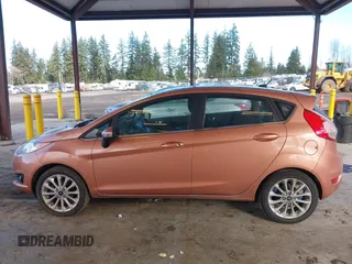 2017 Ford Fiesta Titanium with VIN 3FADP4FJ6HM139455, listed as a IAAI auction lot 41533050 with 104,788 mi miles and . Bid and sale history available at DreamBid. Image 14.