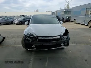 2022 Tesla Model Y Long Range with VIN 7SAYGDEE5NF435702, listed as a Copart auction lot 43754325 with 47,121 mi miles and Salvage Title. Bid and sale history available at carsss.com. Image 10.