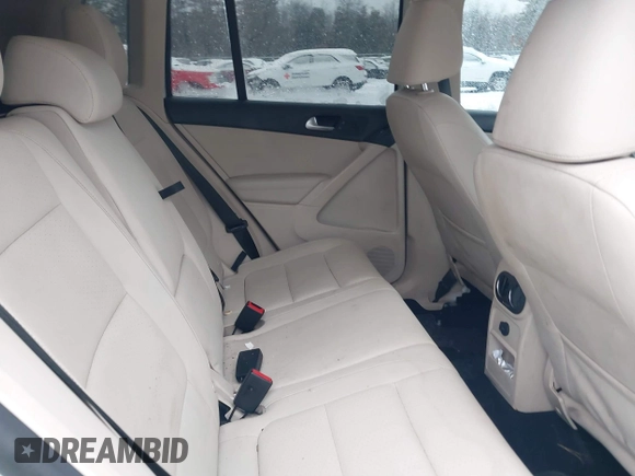 2016 Volkswagen Tiguan S with VIN WVGBV7AX2GW550558, listed as a IAAI auction lot 41553304 with 100,864 mi miles and . Bid and sale history available at DreamBid. Image 8.