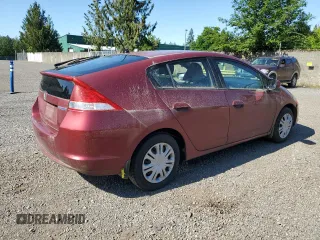 2010 Honda Insight LX with VIN JHMZE2H5XAS012469, listed as a Copart auction lot 59238935 with 271,731 mi miles and Clean title. Bid and sale history available at DreamBid. Image 3.