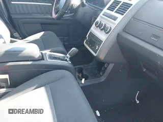 2010 Dodge Journey SXT with VIN 3D4PH5FVXAT107023, listed as a IAAI auction lot 41747572 with 165,568 mi miles and . Bid and sale history available at DreamBid. Image 5.