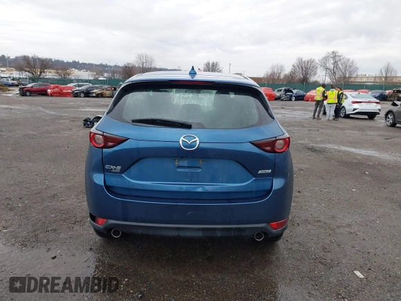 2019 Mazda CX-5 Sport with VIN JM3KFBBM5K0668678, listed as a IAAI auction lot 41811146 with 102,634 mi miles and . Bid and sale history available at DreamBid. Image 16.