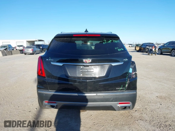 2024 Cadillac XT5 FWD Premium Luxury with VIN 1GYKNCRS4RZ729461, listed as a IAAI auction lot 41411300 with 5,760 mi miles. Bid and sale history available at carsss.com. Image 16.