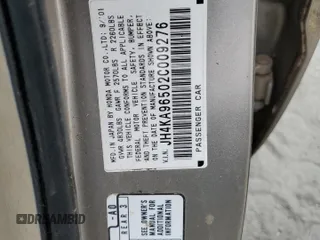 2002 Acura RL z VIN JH4KA96502C009276, wystawiony jako Copart lot #53978405 z przebiegiem 221 090 mil mil oraz Szkoda całkowita • Salvage title. Historia ofert i sprzedaży dostępna na DreamBid. Obrazek 13.