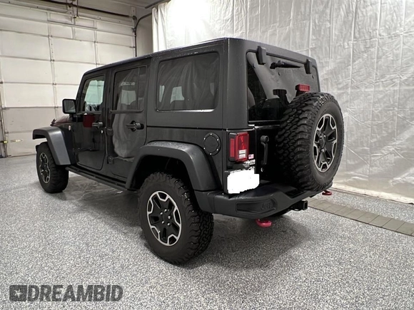 2014 Jeep Wrangler Unlimited Rubicon X with VIN 1C4HJWFG2EL312737, listed as a Copart auction lot 56547735 with 121,477 mi miles and Clean title. Bid and sale history available at DreamBid. Image 3.