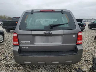 2009 Ford Escape XLS z VIN 1FMCU02799KC31553, wystawiony jako Copart lot #55219775 z przebiegiem 109 154 mil mil oraz Szkoda całkowita • Salvage title. Historia ofert i sprzedaży dostępna na DreamBid. Obrazek 6.