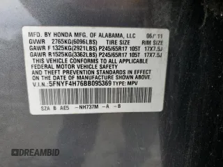 2011 Honda Pilot EX-L z VIN 5FNYF4H76BB095369, wystawiony jako Copart lot #57026435 z przebiegiem 128 443 mil mil oraz Szkoda całkowita • Salvage title. Historia ofert i sprzedaży dostępna na DreamBid. Obrazek 13.