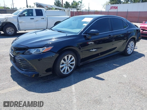 2020 Toyota Camry LE with VIN 4T1C11AKXLU955851, listed as a IAAI auction lot 41996827 with 59,008 mi miles and . Bid and sale history available at carsss.com. Image 23.