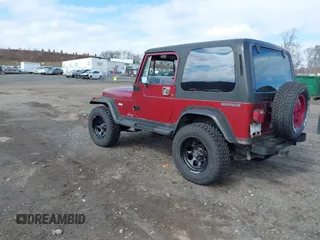1987 Jeep Wrangler Laredo with VIN 2BCCZ8148HB535575, listed as a IAAI auction lot 41889583 with 221,521 mi miles. Bid and sale history available at carsss.com. Image 3.
