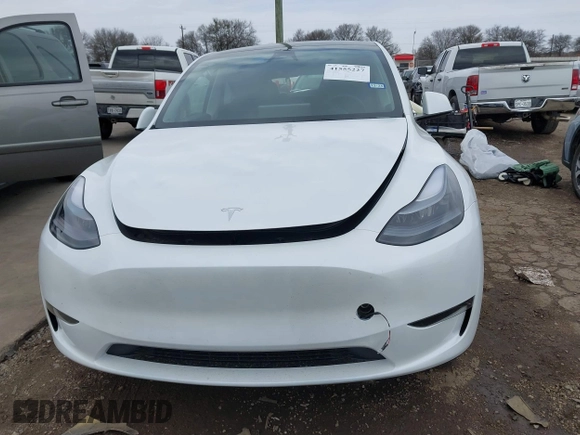 2025 Tesla Model Y Long Range z VIN 7SAYGDED9SA357876, wystawiony jako IAAI lot #41555227 z przebiegiem 1 600 mil mil oraz . Historia ofert i sprzedaży dostępna na DreamBid. Obrazek 11.
