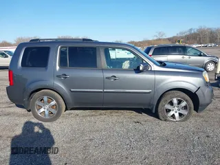 2012 Honda Pilot Touring with VIN 5FNYF3H9XCB042090, listed as a IAAI auction lot 41751359 with 140,424 mi miles and . Bid and sale history available at carsss.com. Image 13.