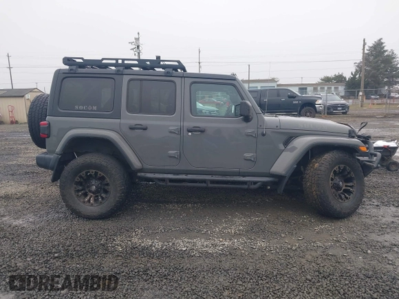 2019 Jeep Wrangler Unlimited Sahara с VIN 1C4HJXEG1KW543811, выставлен на аукционе IAAI как лот 41291234 с пробегом 63 714 миль миль и . История ставок и продаж доступна на DreamBid. Изображение 14.