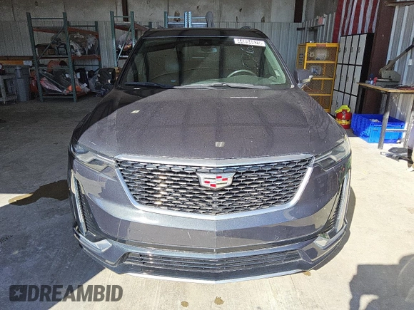 2021 Cadillac XT6 Premium Luxury z VIN 1GYKPDRS7MZ179150, wystawiony jako Copart lot #44894625 z przebiegiem 48 869 mil mil oraz Czysty tytuł • Clean title. Historia ofert i sprzedaży dostępna na DreamBid. Obrazek 5.