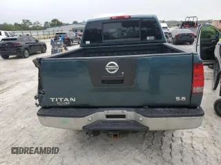 2006 Nissan Titan LE z VIN 1N6BA07B16N557411, wystawiony jako Copart lot #86058634 z przebiegiem 263 198 mil mil oraz Szkody całkowita. Historia ofert i sprzedaży dostępna na DreamBid. Obrazek 6.