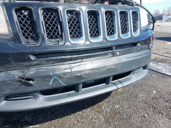 2014 Jeep Compass Sport with VIN 1C4NJCBB1ED587005, listed as a IAAI auction lot 41706302 with 184,419 mi miles. Bid and sale history available at carsss.com. Image 6.