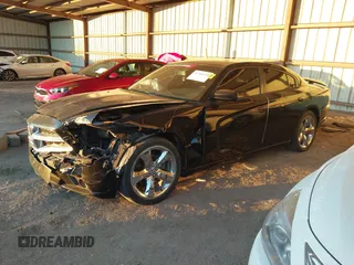 2014 Dodge Charger SXT with VIN 2C3CDXHG9EH305256, listed as a IAAI auction lot 41360219 with 170,192 mi miles and . Bid and sale history available at DreamBid. Image 17.
