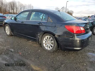 2010 Chrysler Sebring Limited with VIN 1C3CC5FB2AN120496, listed as a Copart auction lot 82131024 with 106,563 mi miles and Salvage Title. Bid and sale history available at carsss.com. Image 2.