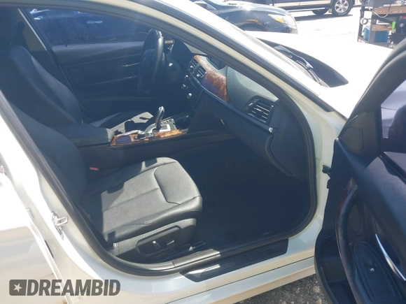 2014 BMW 3 Series 320i with VIN WBA3B1C51EK131063, listed as a IAAI auction lot 42043086 with 92,306 mi miles. Bid and sale history available at carsss.com. Image 5.