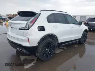 2024 Cadillac XT4 FWD Sport with VIN 1GYFZER42RF246488, listed as a IAAI auction lot 42029551 with 6,476 mi miles and . Bid and sale history available at DreamBid. Image 4.