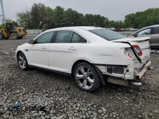2012 Ford Taurus SHO with VIN 1FAHP2KT2CG141879, listed as a Copart auction lot 56558365 with 105,230 mi miles and Salvage title. Bid and sale history available at DreamBid. Image 2.