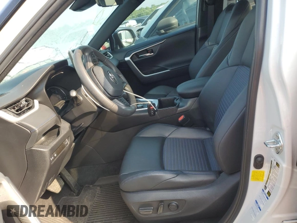 2022 Toyota RAV4 Hybrid XSE с VIN 2T3E6RFVXNW030847, выставлен на аукционе Copart как лот 57119115 с пробегом 64 757 миль миль и Списание • Salvage title. История ставок и продаж доступна на DreamBid. Изображение 7.